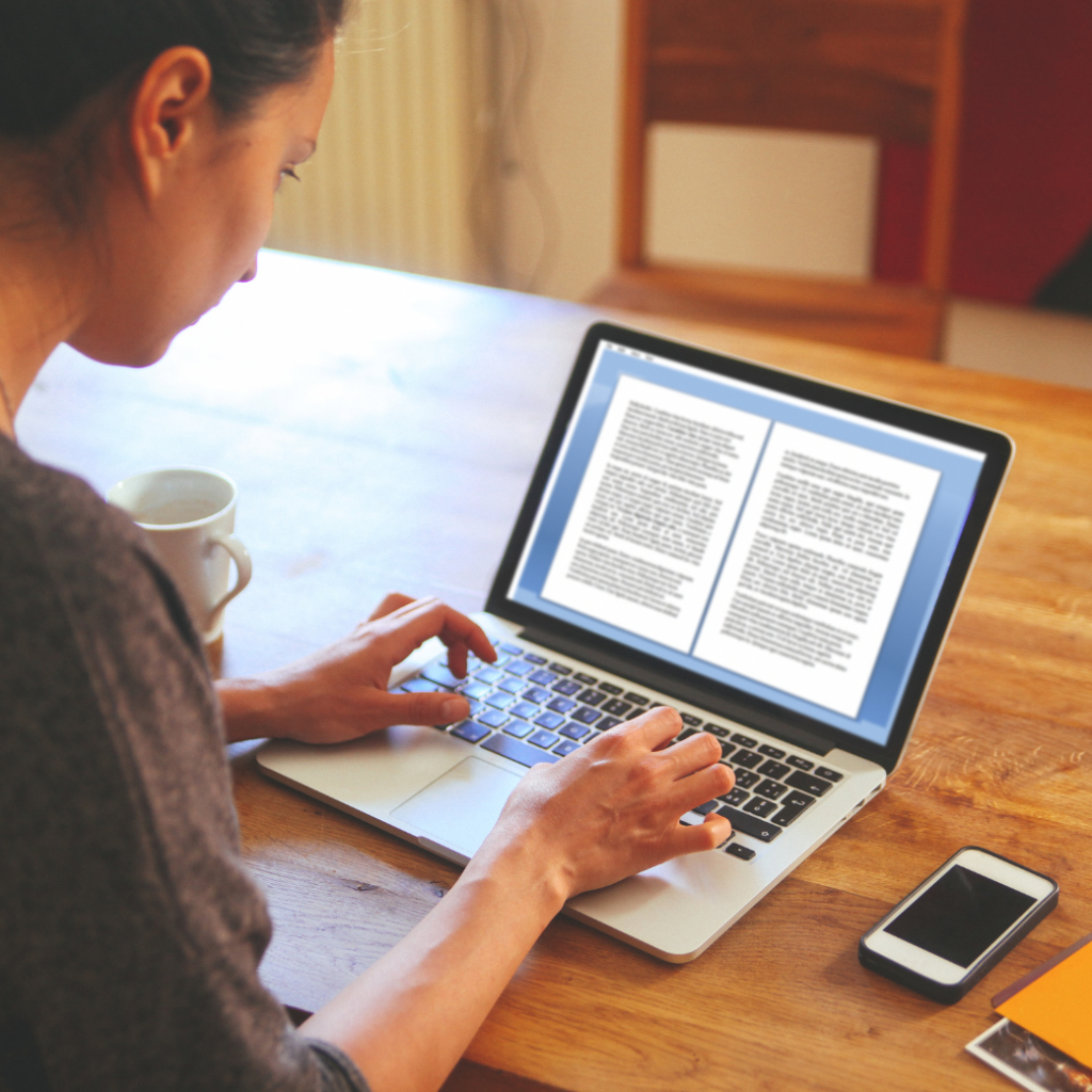 a woman typing up her plan for the workhop